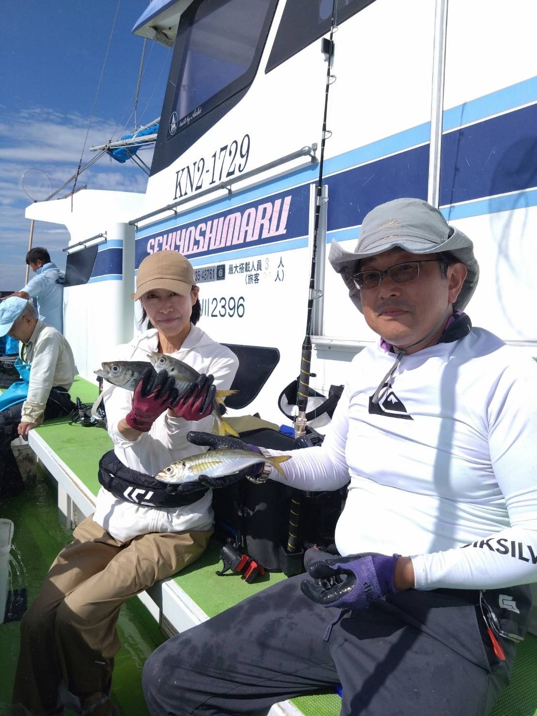 くに丸 ミッドレングスツイードパイピングダックダウンコート